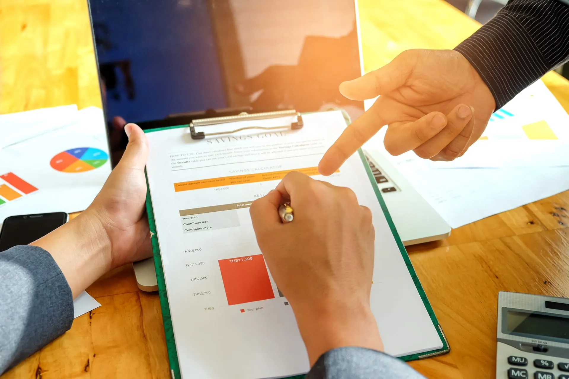 Advisers reviewing business figures together Clarion Accountancy & Taxation Oakham